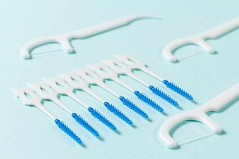 Close-up interdental brushes on the blue background Stock Photos