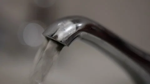 Close-up interior: Chrome water tap, water on and then off, copy space Stock Footage 305133523