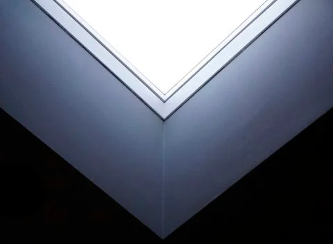 Close up interior lower corner view of a real square single window Stock Photos
