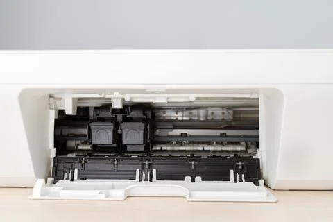 Close-Up Interior View Of A Home Printer With Open Tray Showing Ink Cartrid.. Stock Photos