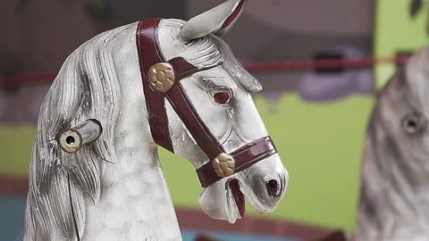 Close up interior view inside Carousel. colourful retro vintage wooden horses Stock Footage 133938555