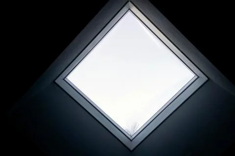 Close up interior view of a real square single window Stock Photos