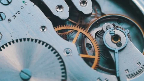 Close up of a internal clock mechanism Stock Footage