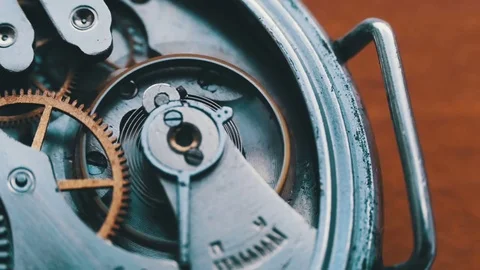 Close up of a internal clock mechanism Stock Footage