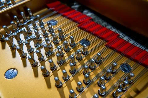 A close-up of the internal string structure of a top grand piano Foto stock