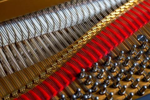 A close-up of the internal string structure of a top grand piano Foto stock
