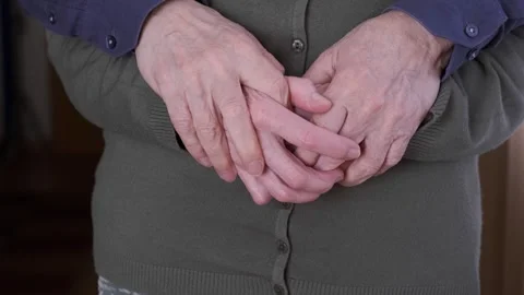 Close-Up of Intertwined Hands of an Elderly Couple Expressing Love and Bond Stock Footage 307742472