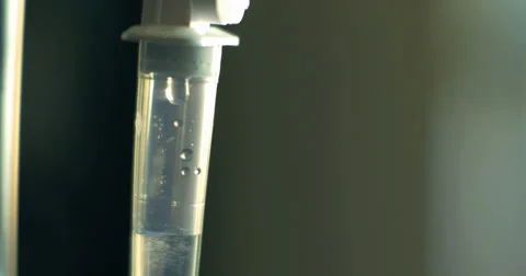 Close up Intravenous IV drip fast drip interior setting 4K Stock Footage 66580276