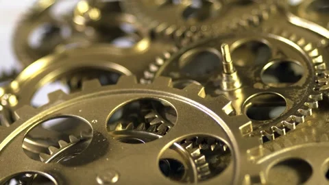 Close up of intricate brass clockwork gears and mechanical watch components Stock Footage 345169185