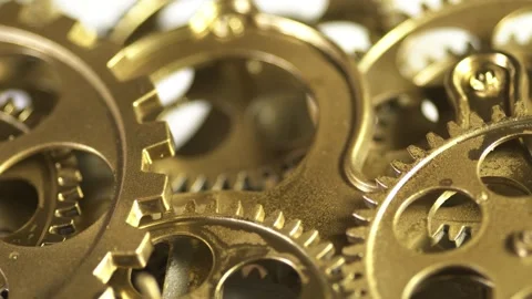 Close Up of Intricate Golden Clockwork Gears and Mechanical Mechanism Stock Footage 345169187
