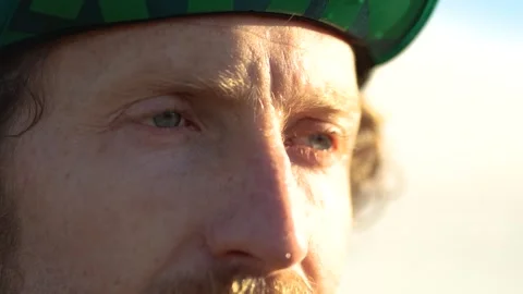 Close introspective shot of a man with blue eyes and a determined look Stock Footage 340219117