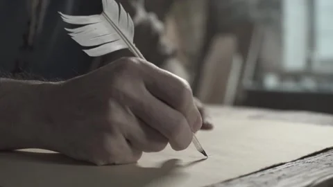 Close up of inventor hands sketching flying machine wing design with feather pen 스톡 동영상 337649631