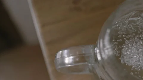 Close Up Of An Ionizer While Purifying Water Vídeo Stock 126980797
