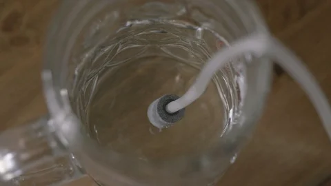 Close Up Of An Ionizer While Purifying Water Vídeo Stock 126980858