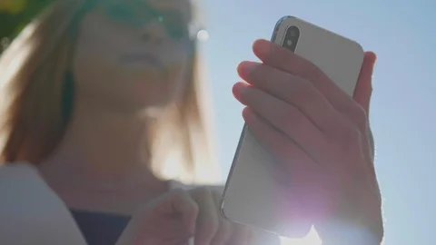 Close iPhone Mobile Phone with Young Woman Technology Smartphone Beautiful Girl Stock Footage 129532198