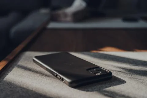 Close up of iPhone Pro Max by Apple on a table at home, selective focus. Stock Photos