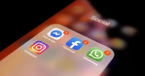 Close up of iPhone Screen with Social Media icons From Facebook Group Stock Footage 111782756