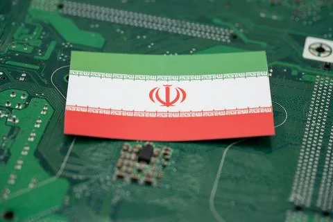 Close up of Iranian flag with computer hardware Stock Photos
