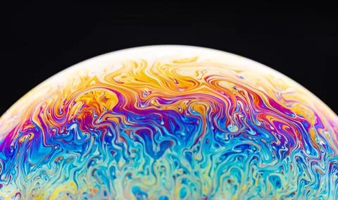 Close-up of iridescent soap bubble surface with swirling colorful patterns .. イラスト素材