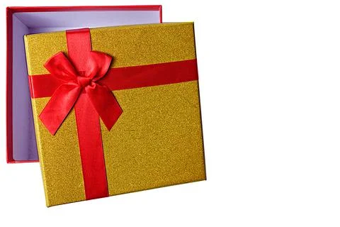 Close up isolate of gift golden box with red ribbon Stock Photos