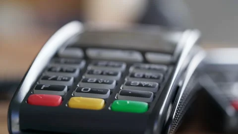 Close up isolated concept shot of slow swipe through casual pos card-reader syst Video stock 199491683