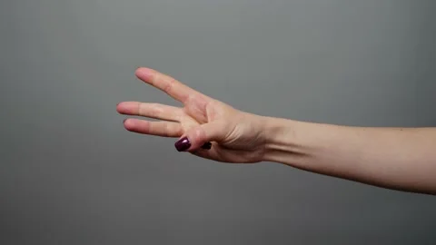 Close-up of isolated female hand counting from 0 to 5. Stock Footage 236256702