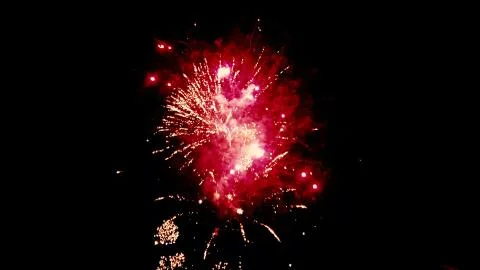 Close up isolated image of a firework show as multiple fireworks explode Stock-Fotos
