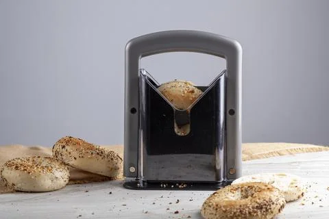 Close up isolated image showing fresh baked sessame bagels on kitchen counter Stock Photos