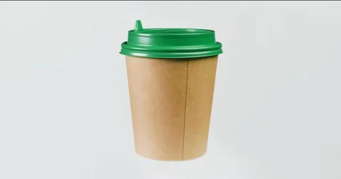 Close-up of isolated rotating paper coffee cup Stock Footage 98759915
