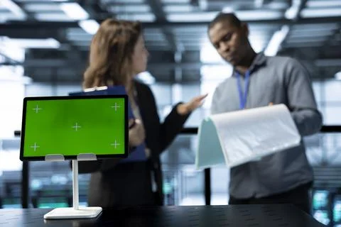 Close up of isolated screen device used by workers adjusting server room Stock Photos
