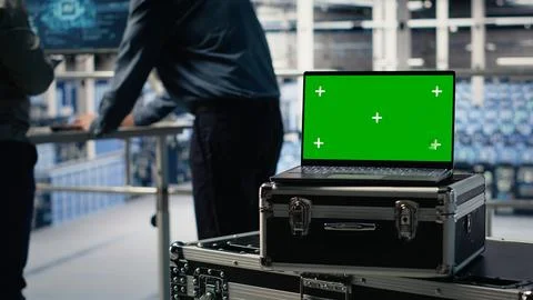 Close up of isolated screen laptop in front of data center programmers Foto stock