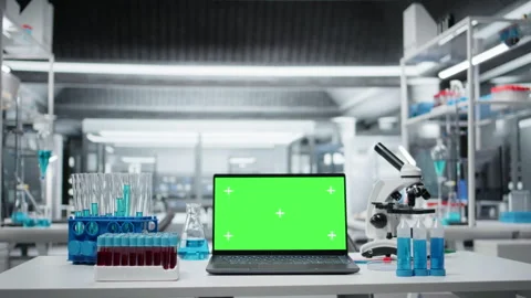 Close up of isolated screen laptop on workbench in sterile empty laboratory Stock Footage 325681799