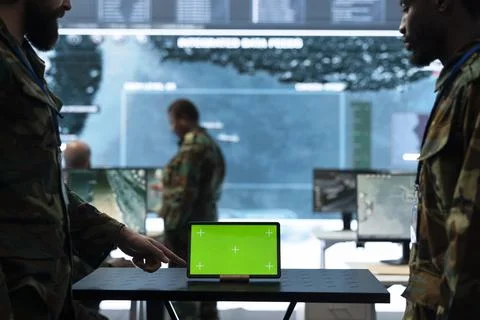 Close up of isolated screen tablet used by army officer gathering intel Stock Photos