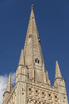 Close up isolated view of the tall tower of Famous historic Norwich cathedral Stock Photos