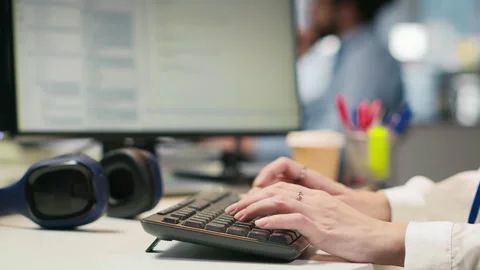 Close up of IT expert coding with AI language model assistance in startup office Vidéo 313014692