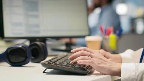 Close up of IT expert coding with AI language model assistance in startup office Stock Photos