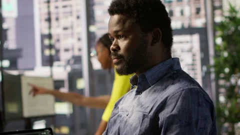 Close up of IT expert programming in office using PC Stock Footage 318160873