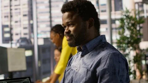 Close up of IT expert programming in office using PC 库存照片