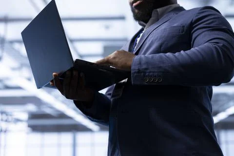Close up of IT expert resolving technical difficulties affecting mainframes Stock Photos