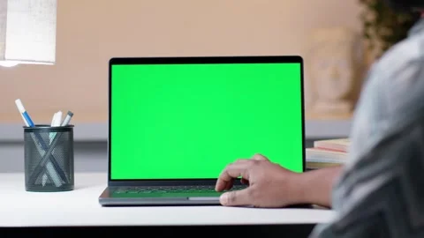 Close-Up of IT Professional Using Laptop with Green Screen in Startup Office Video stock 294873414