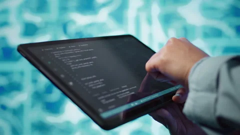 Close up of IT professional using tablet, building AI algorithms 動画素材 278622021