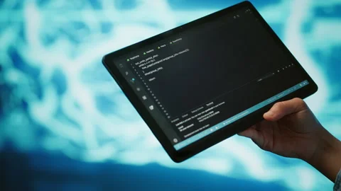Close up of IT professional using tablet, building AI algorithms Stock Footage 278622832