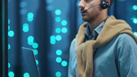 Close-up IT server engineer working on laptop doing data backups techniques and 스톡 동영상 119976641