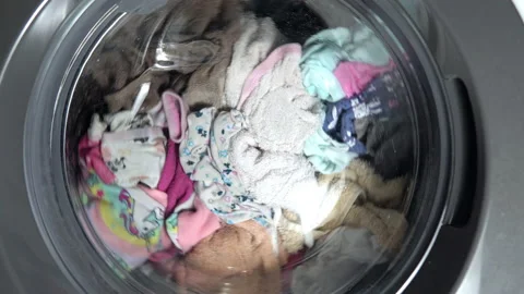 Close-up items are washed in the drum of the washing machine Stockbeeldmateriaal 146337456