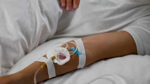 Close-up of IV Drip in Patient's Arm Stock Footage 314699220