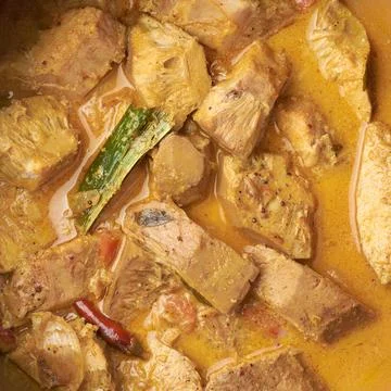 Close-up of jackfruit curry dish cooked with coconut milk Stock Photos