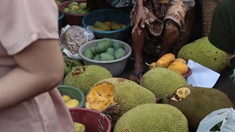 A close-up of a jackfruit seller  Stock Footage 292906348