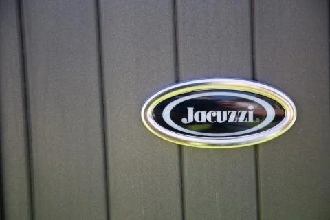 Close up on the jacuzzi logo. Jacuzzi is the name of a trademark whirlpool ba Stock Photos