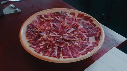 Close Up of Jamon Iberico Spanish Cured Ham Platter Stock Footage 345966530