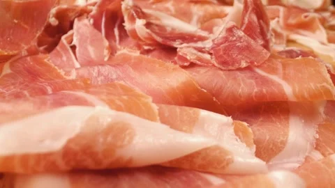 Close-up of Jamon Iberico tapas – the finest Spanish ham. Stock Footage 301446096